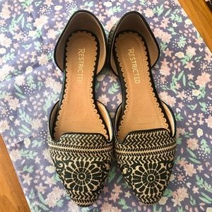 Restricted tribal print pointed toe flats